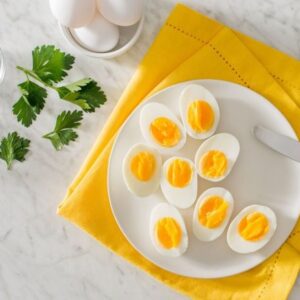 Egg diet meal plan showing boiled eggs with low carb vegetables for weight loss